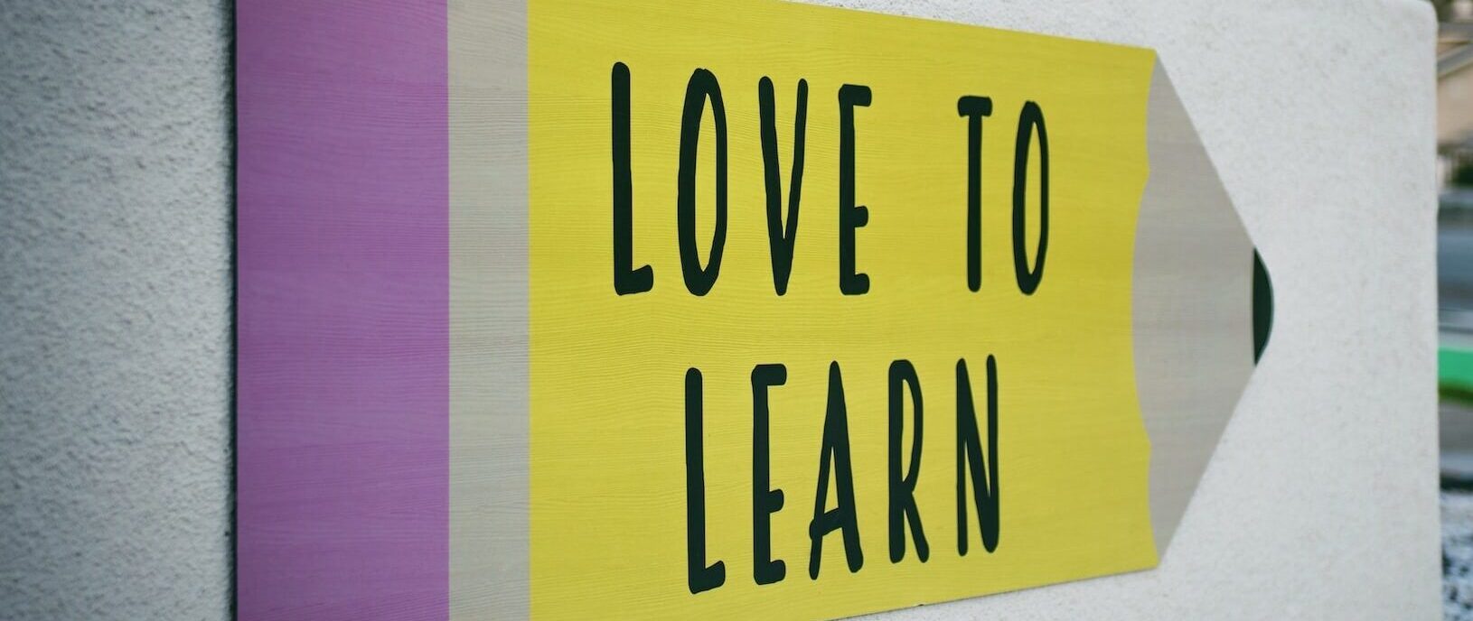 Love to Learn sign on wall